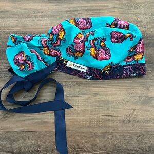 Kim Kaps OR scrub cap ponytail